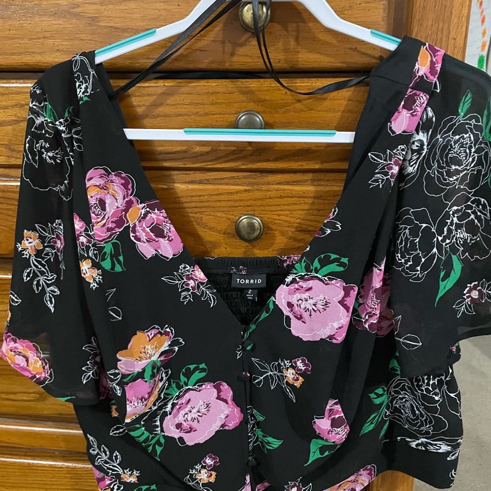 Crop top style that can be worn off the shoulders from Torrid.